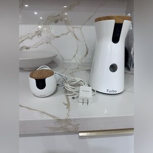 Furbo pet dispenser with mini camera